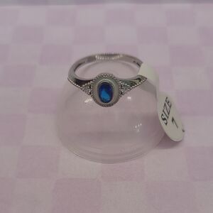Fragrant Jewels Silver Ring with Blue Oval Gem